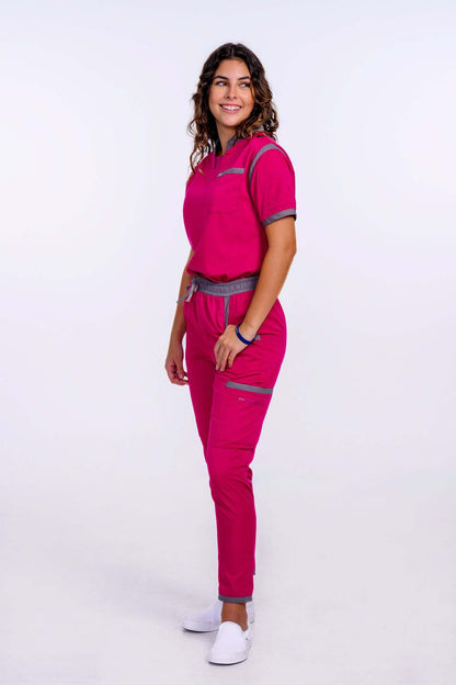 Woman wearing Raspberry Pink / Stone Scrub Pants, showcasing a stylish and professional look with comfort and functionality.